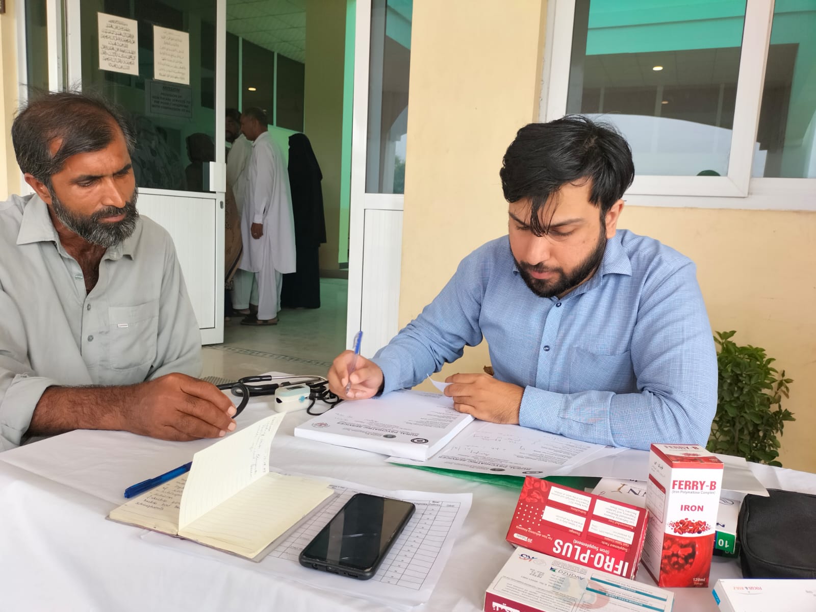 Medical consultation at WASIL Healthcare OPD
